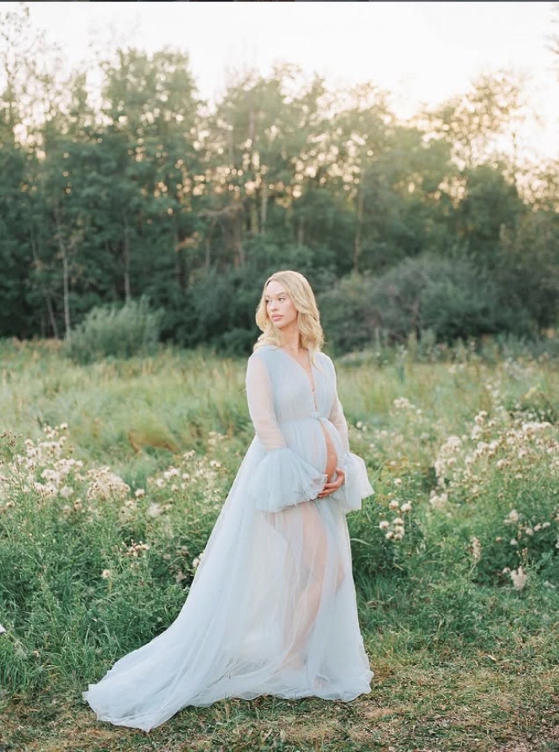 Portrait in a meadow at dusk